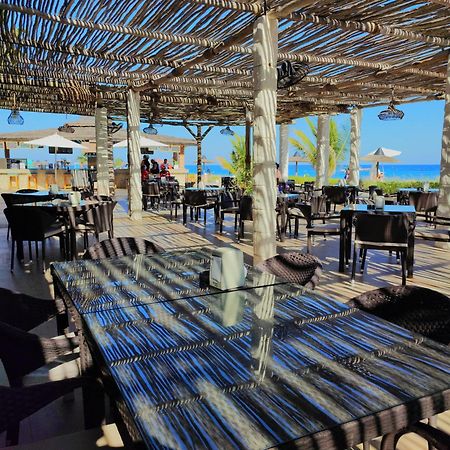 Sandy Beach Hotel & Resort Al Aqah Exterior photo