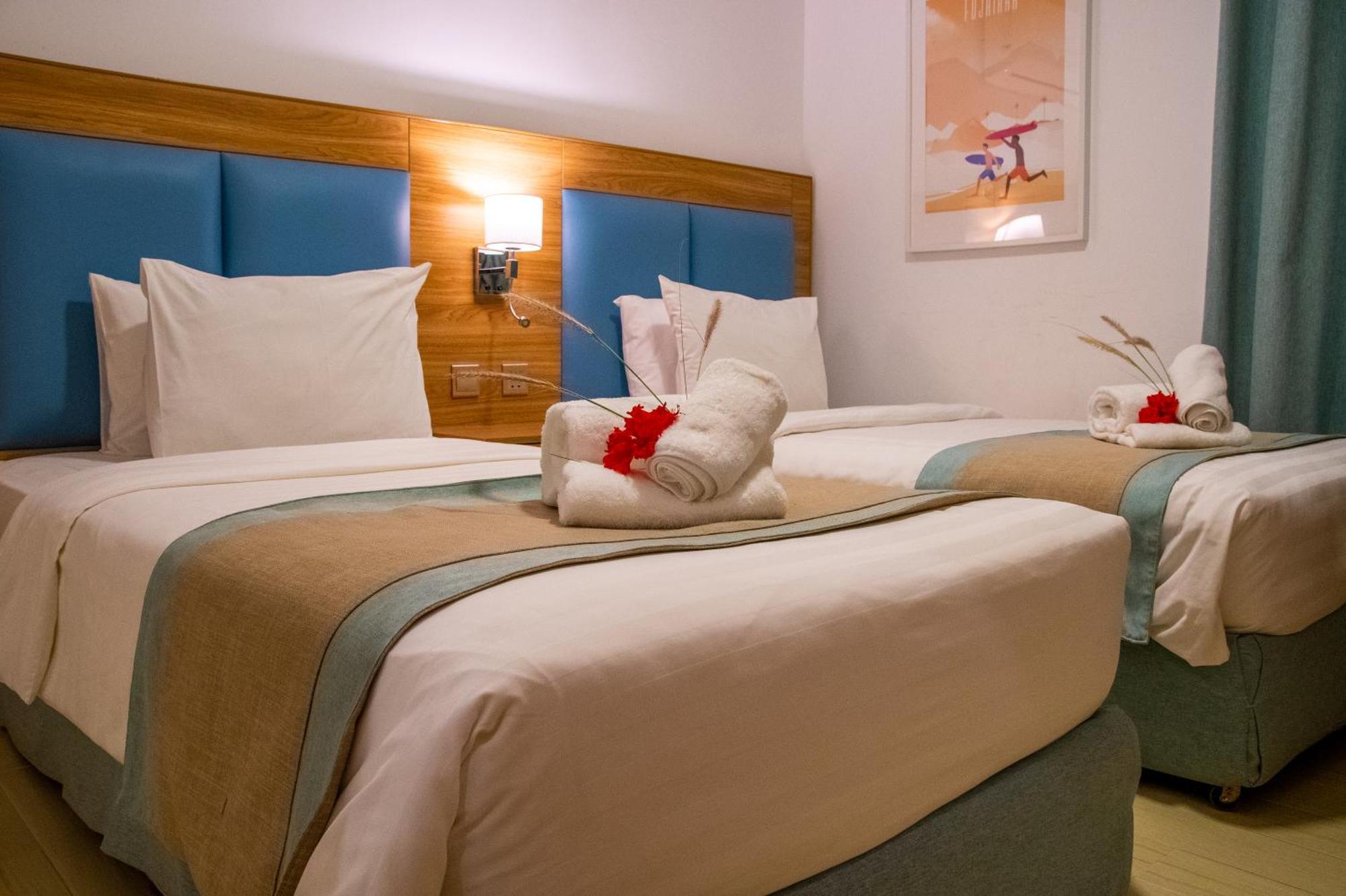 Sandy Beach Hotel & Resort Al Aqah Exterior photo