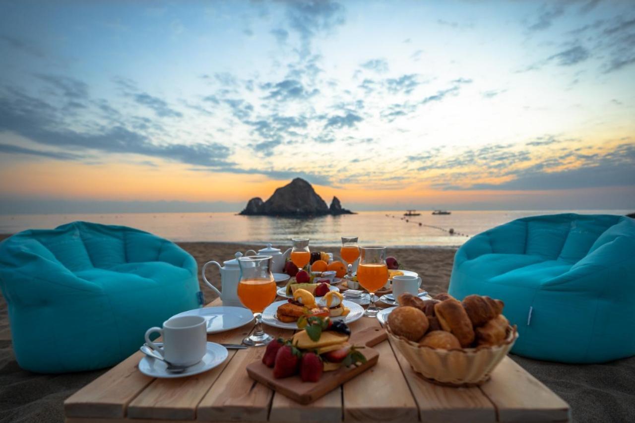 Sandy Beach Hotel & Resort Al Aqah Exterior photo